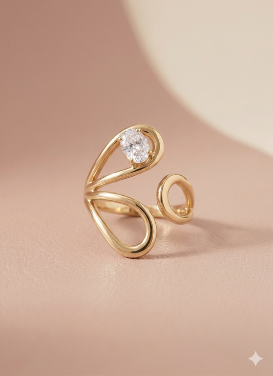 Bague dorée ajustable ajourée design abstrait strass ovale