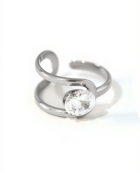 Bague argentée ajustable strass ovale entouré par 2 branche lisse