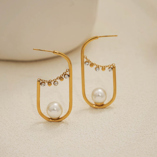 Boucles d'oreilles dorées créoles ovale allongé perle et strass