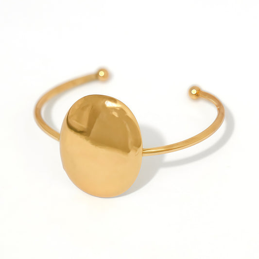 Bracelet machette dorée fine ovale bombé poli