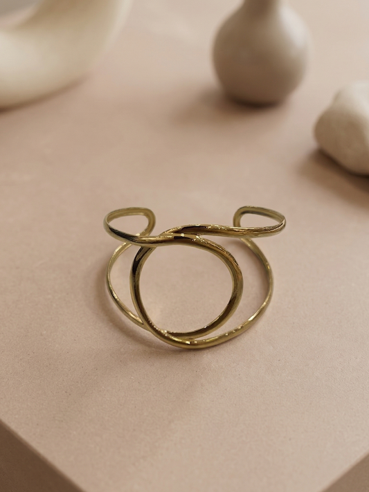 Bracelet manchette ajustable double cercle entrelacé