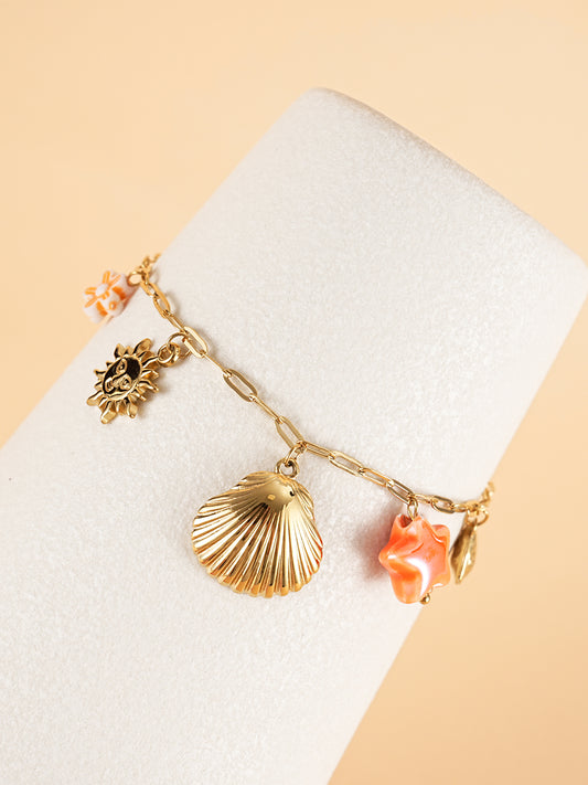 Bracelet chaîne dorée breloques de la mer orange