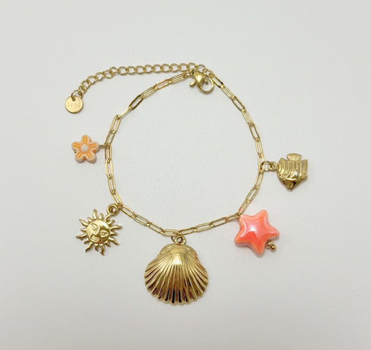 Bracelet chaîne dorée breloques de la mer orange