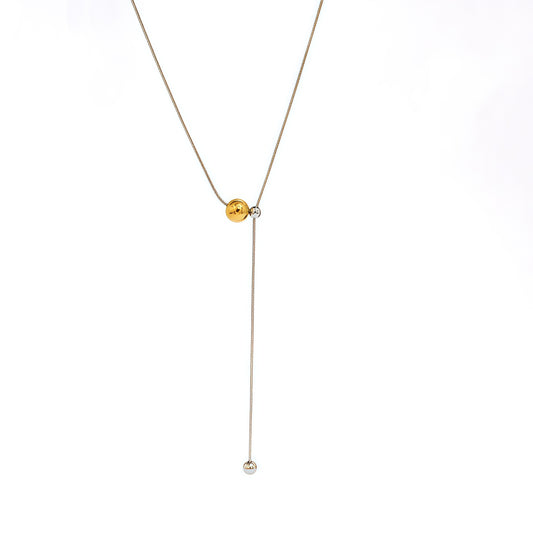 Collier en Y bi-colore argenté et doré billes coulissantes