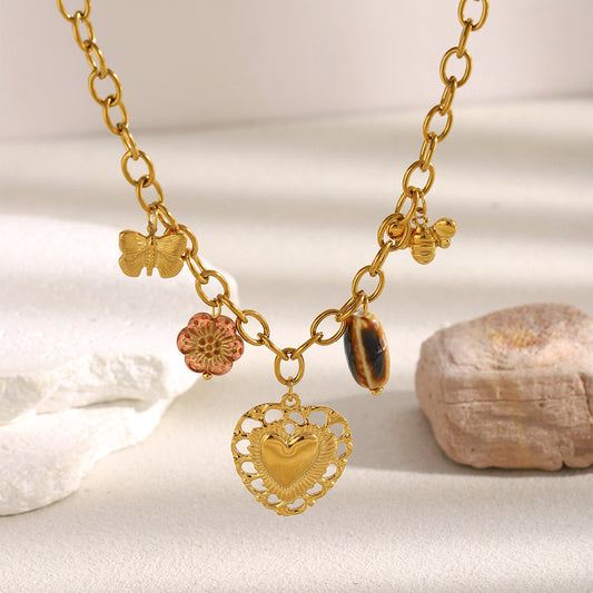 Collier chaîne dorée pendentifs cœurs, abeille, fleur marron