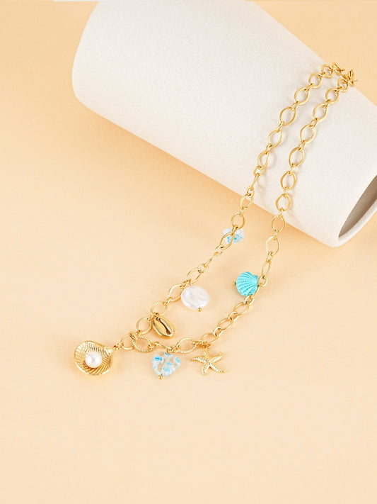 Collier chaîne dorée breloques de la mer bleu