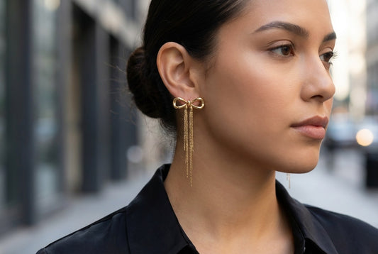 Boucles d’oreilles à nœud et franges pendantes