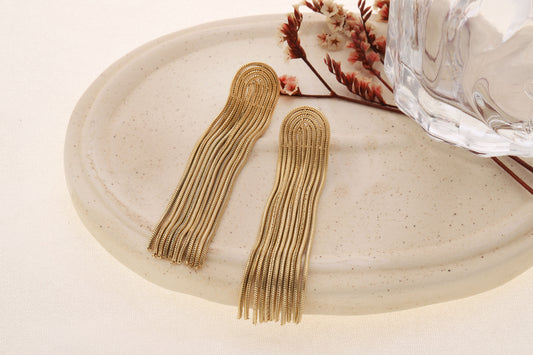 Boucles d'oreilles dorées multiples franges fines