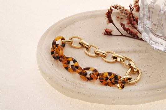 Bracelet semi-épais doré moitié chaîne classique moitié chaîne léopard