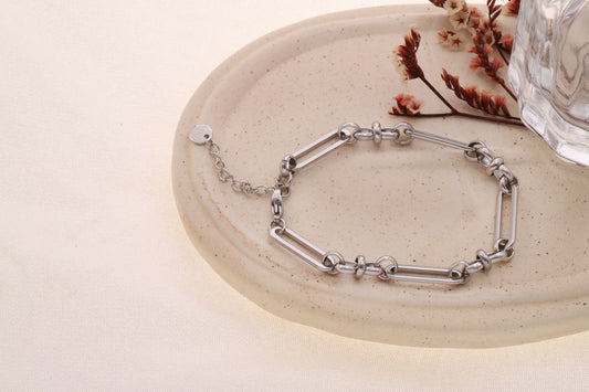 Bracelet argenté chaîne maillons longs ovales et anneaux ronds intercalés