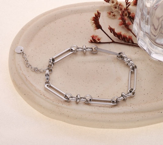 Bracelet chaîne maillons longs ovales et anneaux ronds intercalés