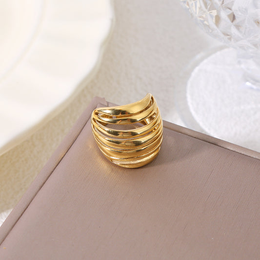 Bague dorée bombée ajouré 7 branches lisses