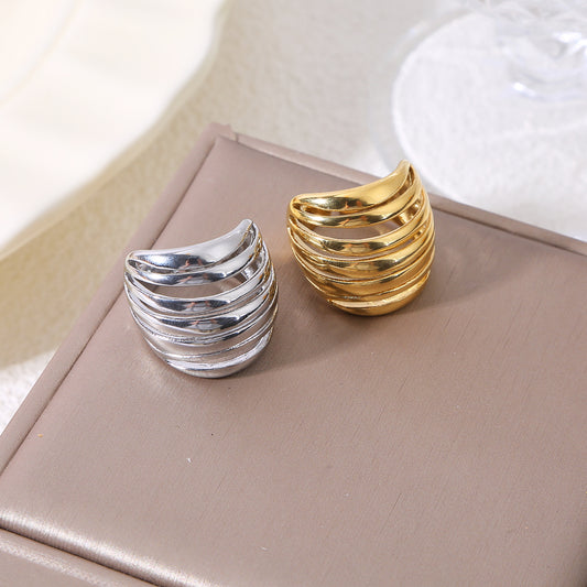 Bague argentée bombée ajouré 7 branches lisses