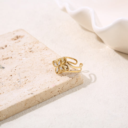 Bague ajustable anti-stress dorée fleur 4 pétales strassées