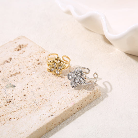 Bague ajustable anti-stress dorée fleur 4 pétales strassées