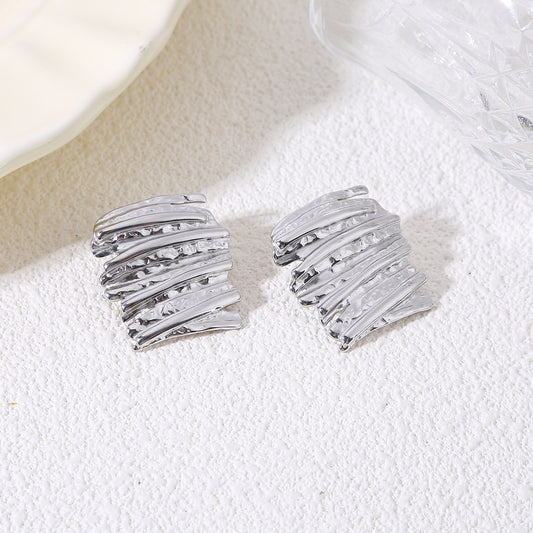 Boucles d’oreilles plaques larges superposées martelées