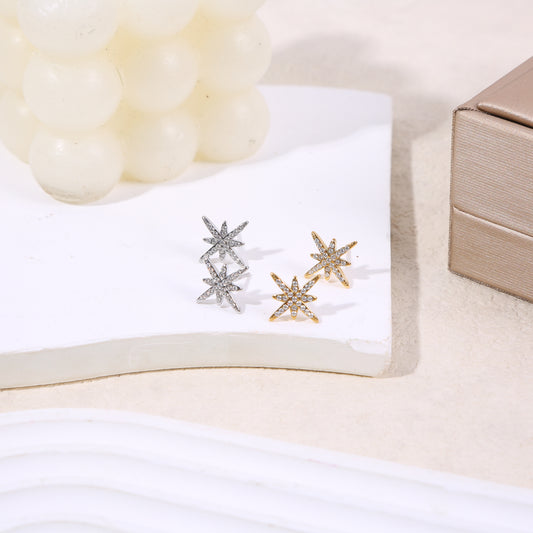 Boucles d'oreilles clou argentées étoile 8 branches strassée
