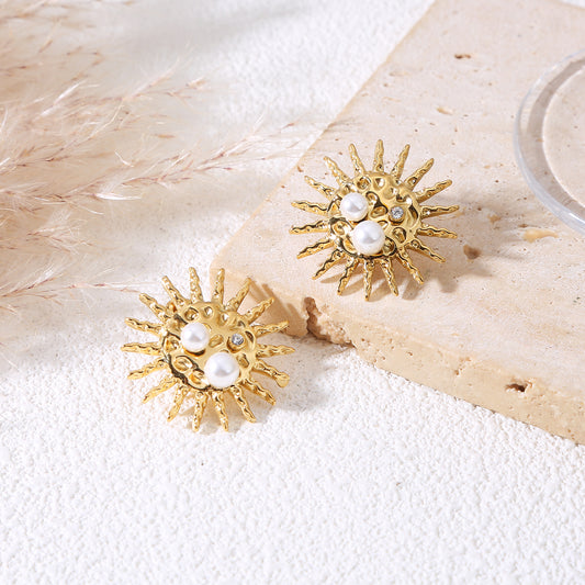 Boucles d'oreilles soleil martelées double perle
