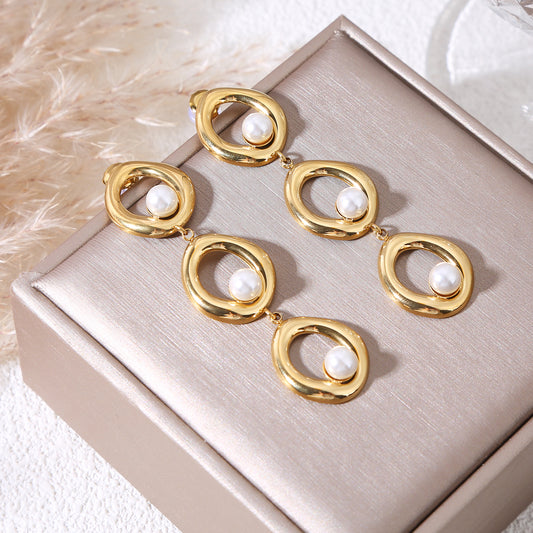 Boucles d'oreilles dorées pendantes 3 cercles finition miroir avec perles