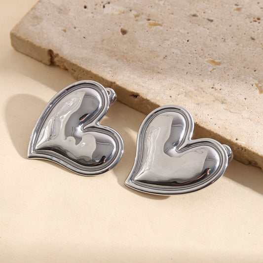 Boucles d'oreilles argentées cœur bombé effet miroir