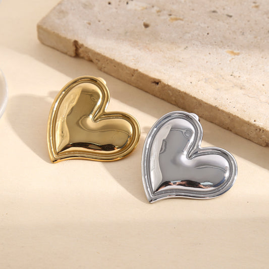 Boucles d'oreilles argentées cœur bombé effet miroir