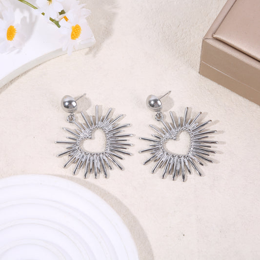 Boucles d’oreilles pendantes cœur rayonnant