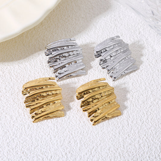 Boucles d’oreilles dorées plaques larges superposées martelées