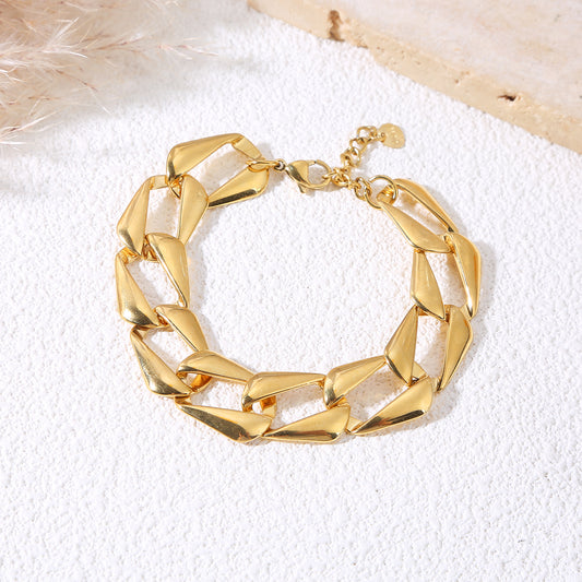 Bracelet chaîne large maillons géométriques dorés effet miroir