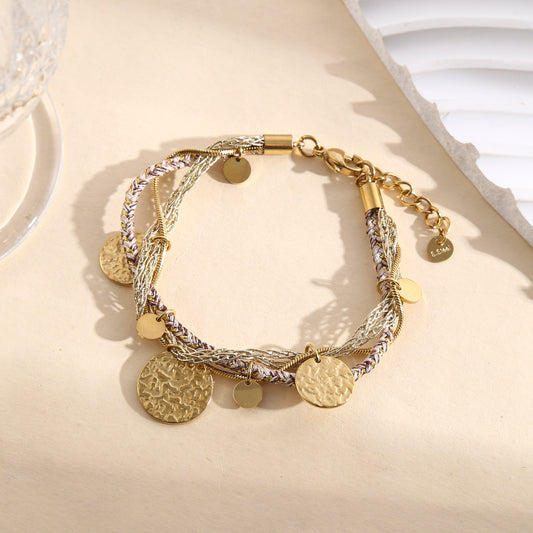 Bracelet multichaînes doré et argenté avec pampilles rondes martelées