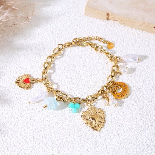Bracelet chaîne dorée breloques cœur ex voto perlée