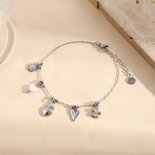 Bracelet argenté chaîne fine pendentifs cœurs lisse et blanche