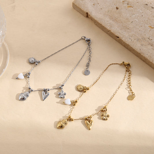 Bracelet argenté chaîne fine pendentifs cœurs lisse et blanche