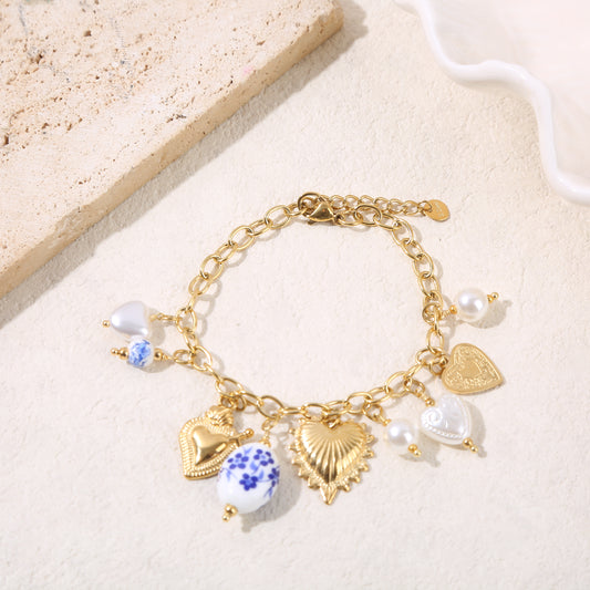 Bracelet chaîne dorée pendentifs bleus et cœur ex-voto