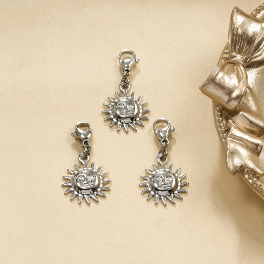 Lot de 3 pendentifs argentés soleil visage