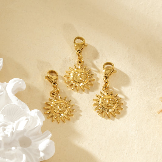 Lot de 3 pendentifs dorés soleil visage