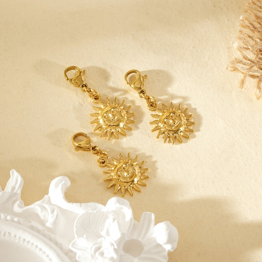 Lot de 3 pendentifs dorés soleil visage