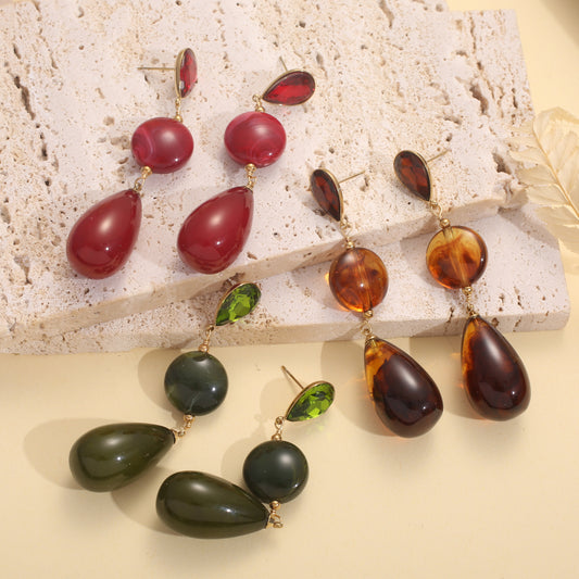 Boucles pendantes trois étages résine et cristaux de verres