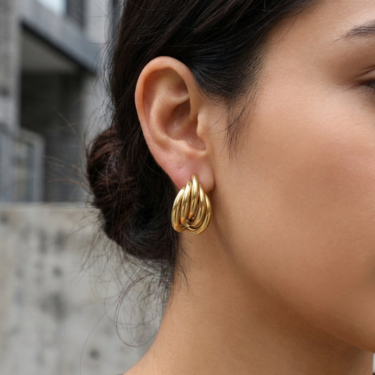 Boucles d’oreilles demi-anneaux entrelacés