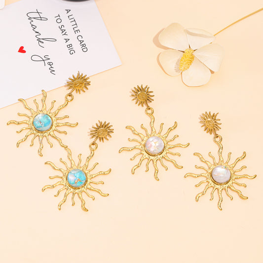 Boucles d’oreilles dorées soleil rayons turquoise