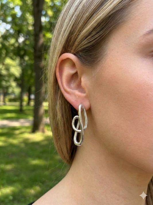 Boucles d’oreilles dorées à anneaux ovales croisés