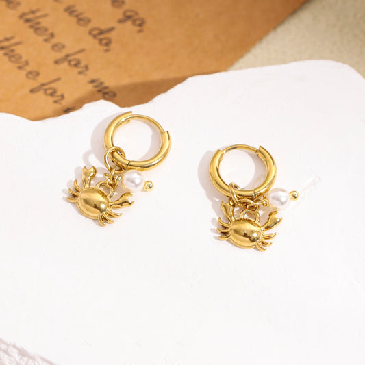 Boucles d'oreilles dorées créoles pendantes crabe et perle