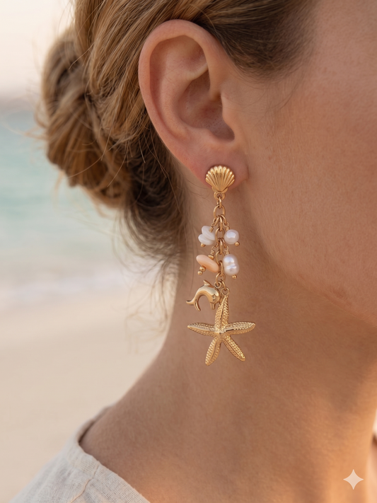 Boucles d'oreilles dorées pendantes étoile de mer, dauphin et pierres