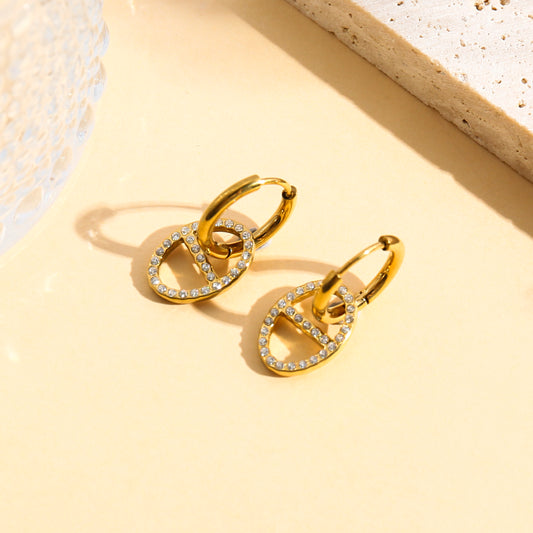 Boucles d'oreilles créoles ovale serti