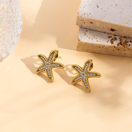 Boucles d'oreilles clous étoile de mer sertie de strass