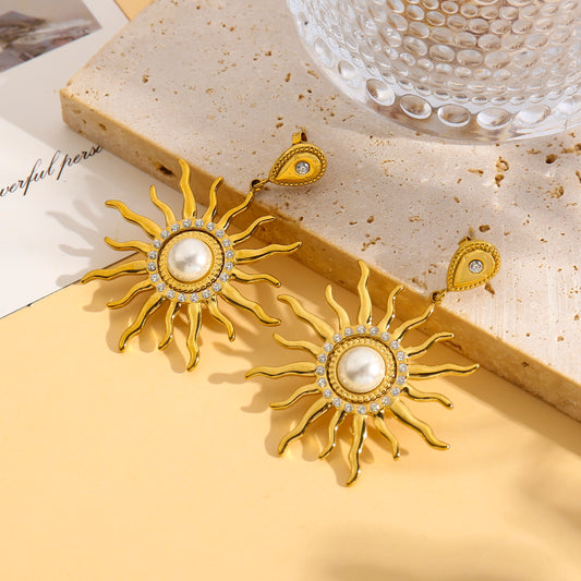Boucles pendantes soleil et perle