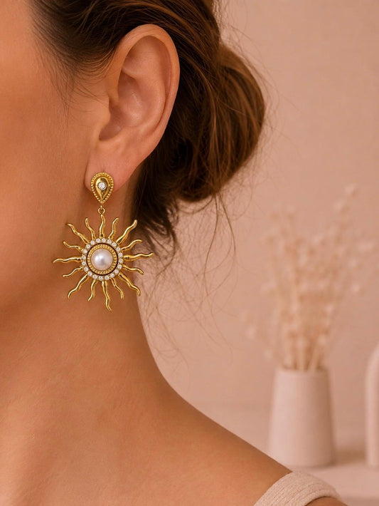 Boucles pendantes soleil et perle