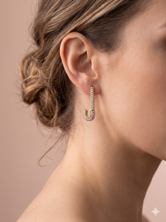 Boucles d'oreilles dorées forme J en strass