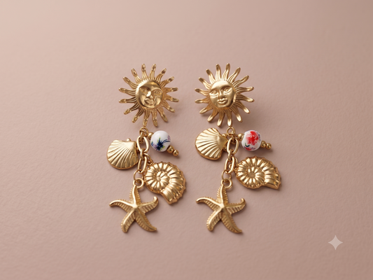 Boucles d'oreilles dorées soleil, coquillages et étoile de mer