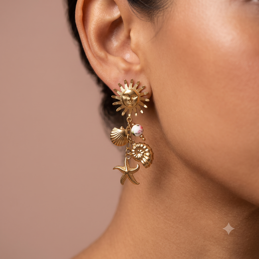 Boucles d'oreilles dorées soleil, coquillages et étoile de mer