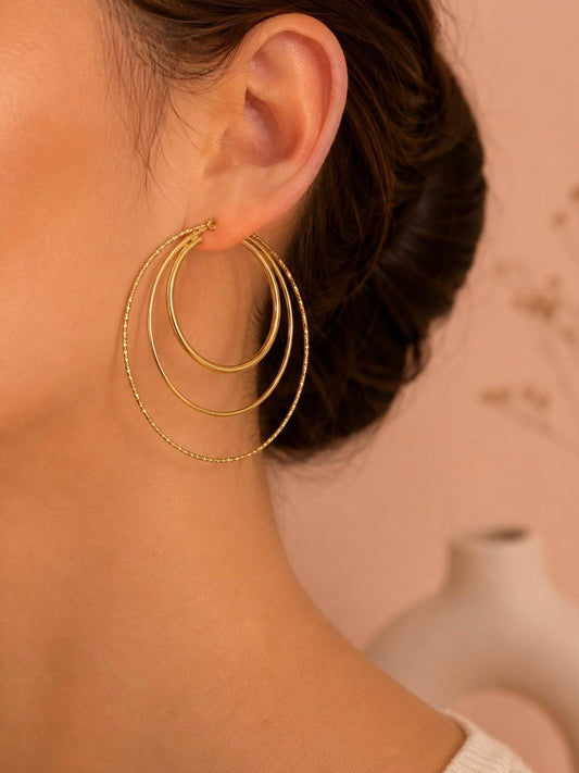 Boucles d'oreilles créoles multi anneaux dorées
